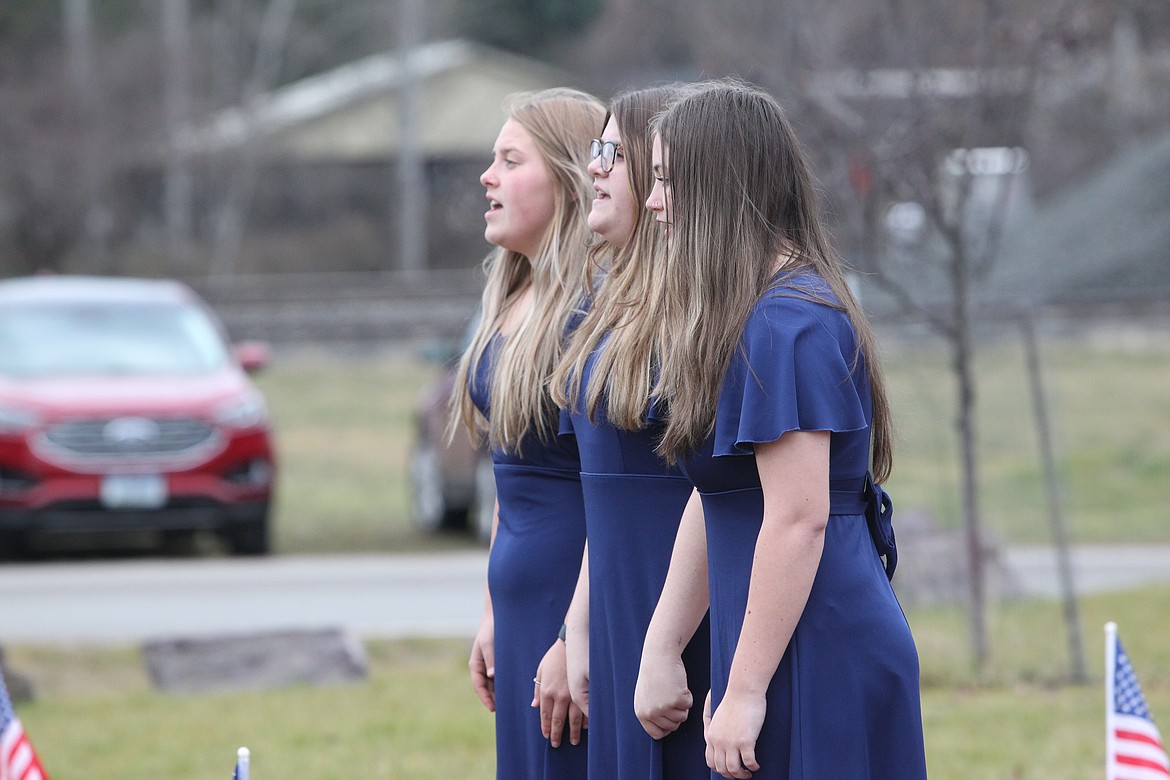 Libby high school students preform the national anthem during a Veterans Day event at Libby's veterans memorial monument. (Will Langhorne/The Western News)