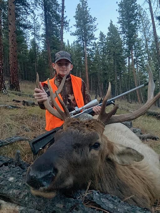 Thirteen-year-old Garrett O’Day, of Superior, shows off the 4x4 bull elk he bagged on the evening of Wednesday, Nov. 10, while hunting with his dad, Mark. They were glassing for deer when the bull showed up. Garrett’s older brother, Wyatt, also bagged a bull on Nov. 11.