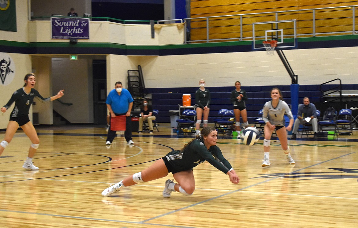 Jordyn Adams (10) dives to save the volleyball during the matchup against Walla Walla Community College on Wednesday.