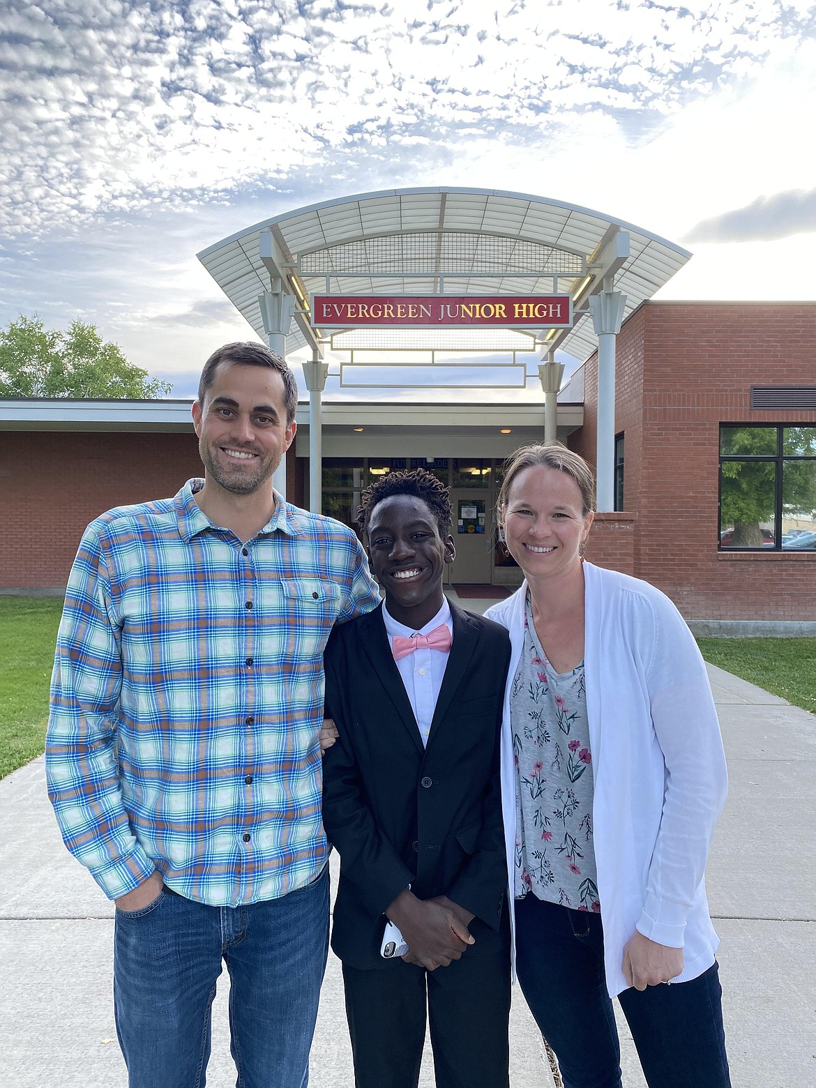 David and Annie Lillard are pictured with their son Simon. Annie credits Evergreen school staff for building long, lasting relationships with Simon that continued throughout his time in Evergreen. Simon has continued to thrive his freshman year at Glacier High School. (Courtesy photo)