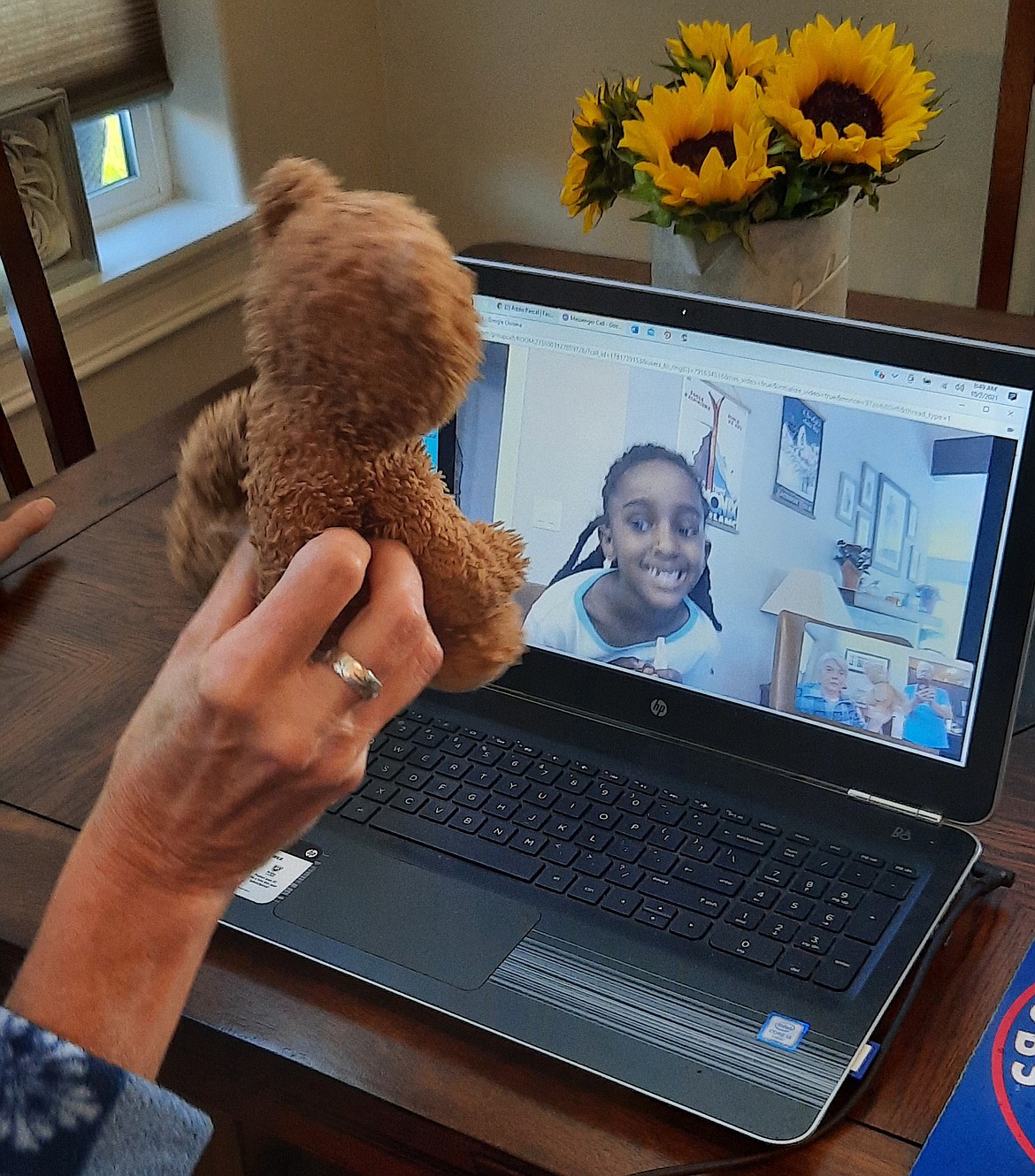 Terri Hayden delivers the news to Naomi Pascal via video call that her lost bear, Teddy, has been found. (photo provided)