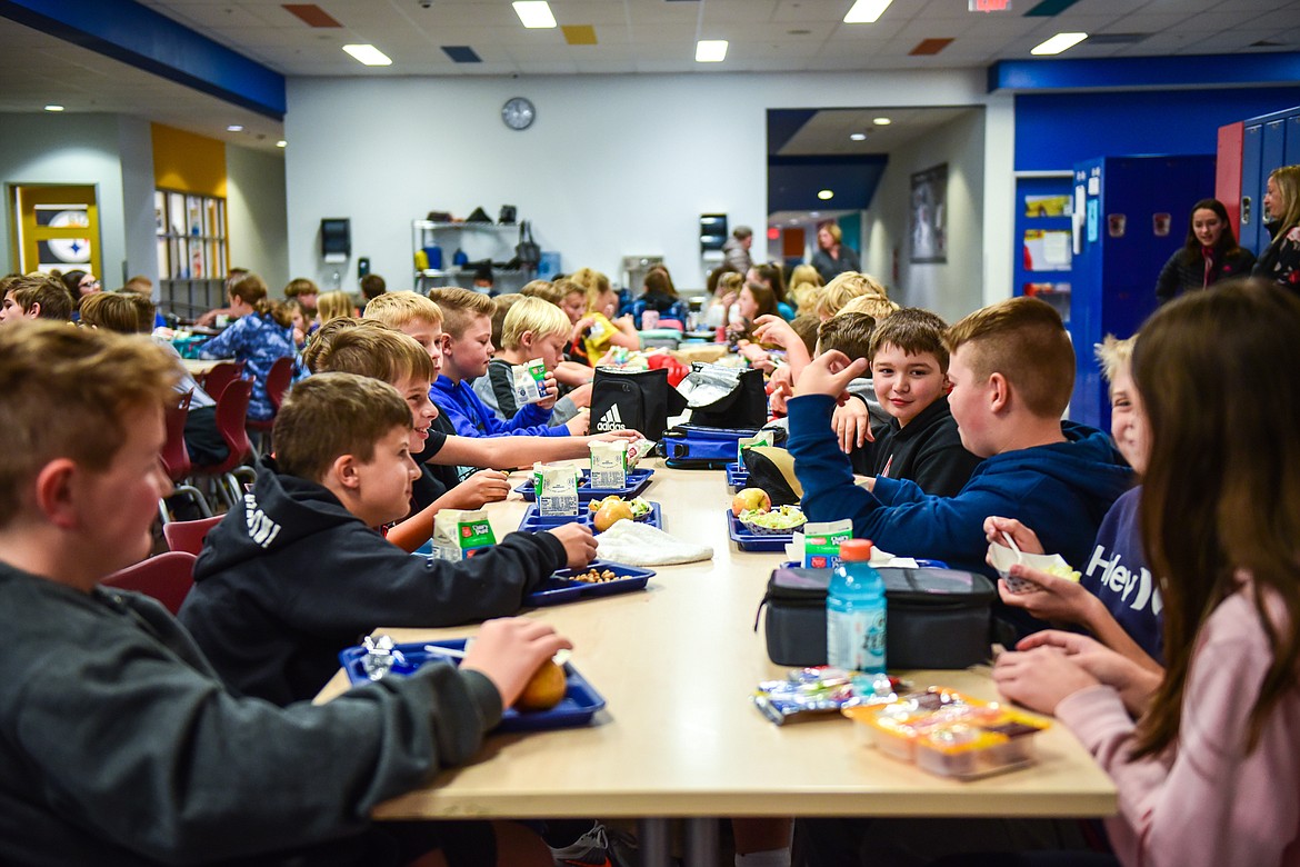 Sixth-grade students eat lunch at West Valley School on Friday, Nov. 12. Currently, total enrollment at West Valley School is 765 kindergarten through eighth-graders. This is an increase of 54 students compared to last year, or 8%. (Casey Kreider/Daily Inter Lake)