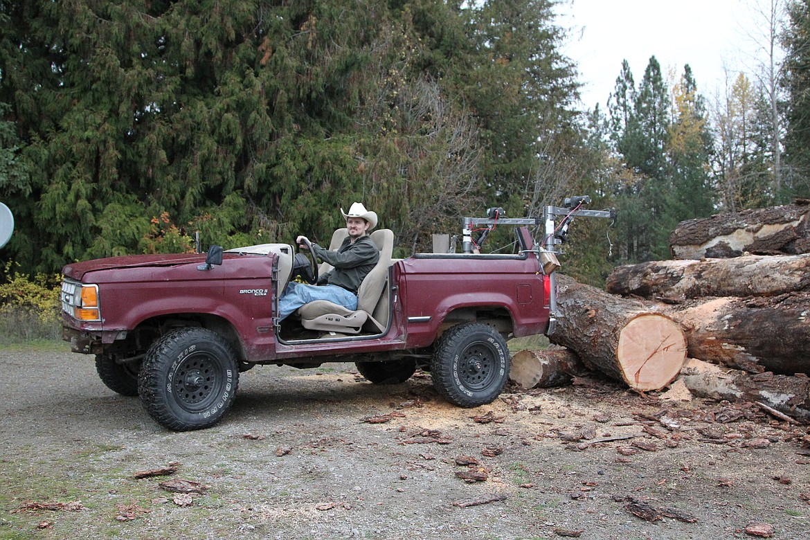 Josh Byers drives a Ford Bronco he transformed into a tractor. (Will Langhorne/The Western News)