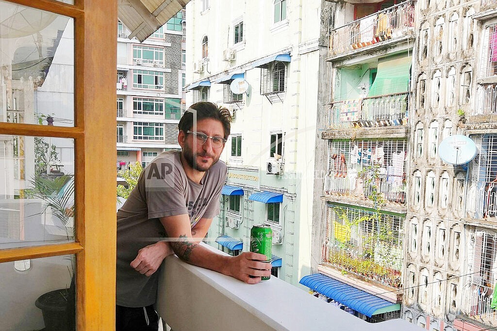 This photo provided by the family courtesy shows Danny Fenster posing for a photo in Yangon, Myanmar, in 2020. A court in military-ruled Myanmar on Friday, Nov. 12, 2021, sentenced detained U.S. journalist Fenster to 11 years in prison after finding him guilty on several charges, including incitement for allegedly spreading false or inflammatory information. (family courtesy photo via AP)