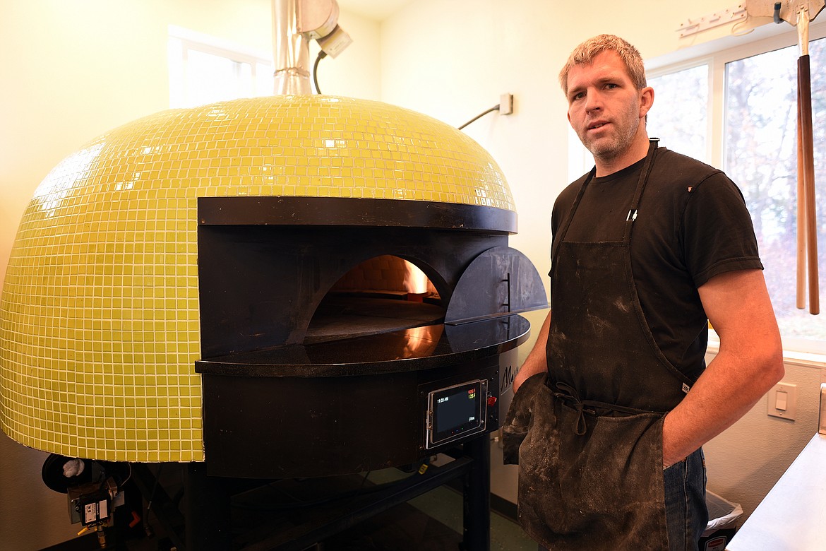 With his brick oven, Nick Erickson recently started Nickerbokker's Pizza to bring the taste of fresh-baked pizza to Evergreen and the Flathead Valley. (Jeremy Weber/Daily Inter Lake)