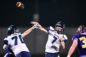 Glacier quarterback Gage Sliter (7) completes a touchdown pass to tight end Luke Bilau (4) in the second quarter against Missoula Sentinel at MCPS Stadium in Missoula on Friday, Nov. 12. (Casey Kreider/Daily Inter Lake)