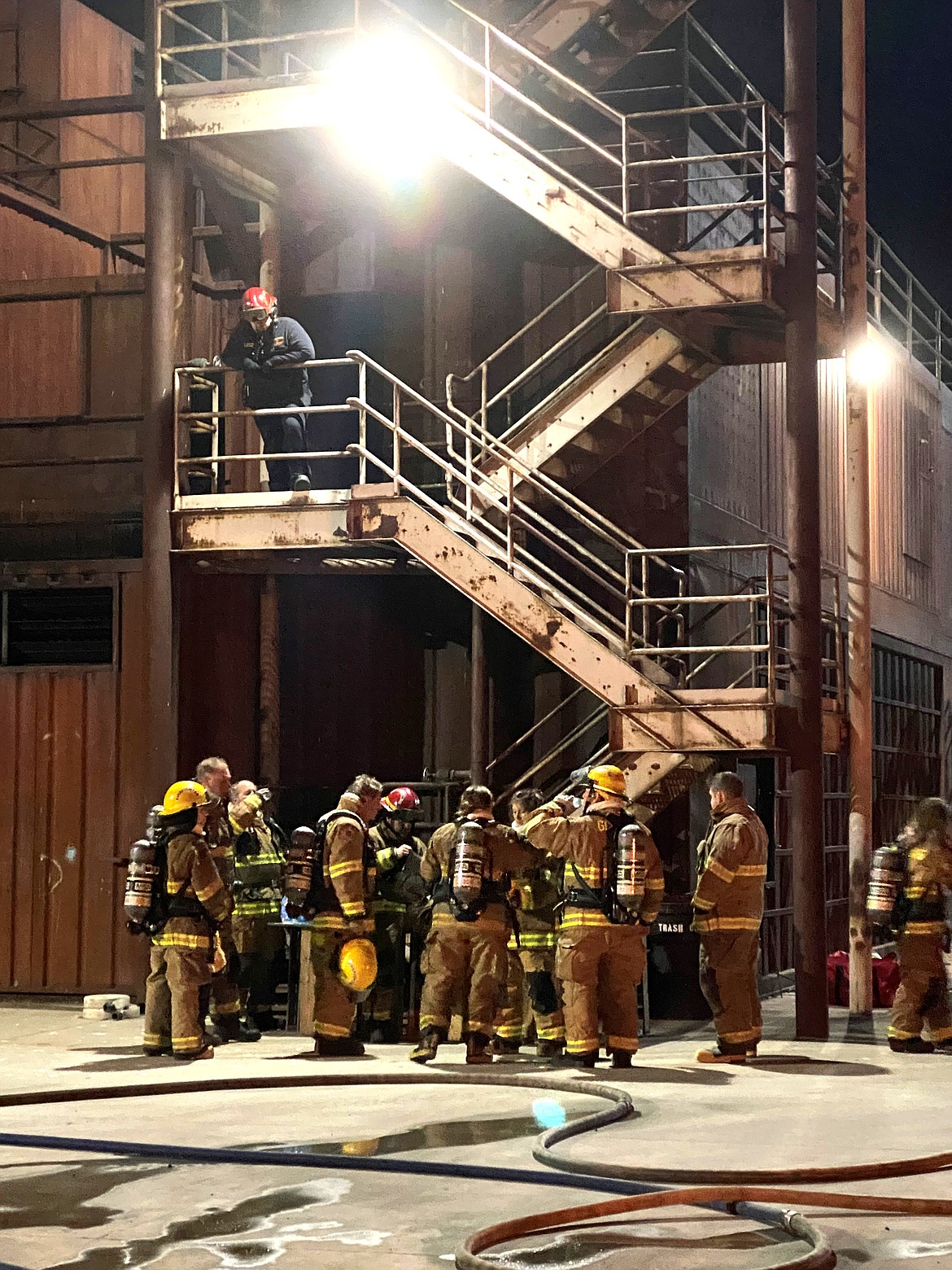 Grant County Fire District personnel gather for a night training exercise.