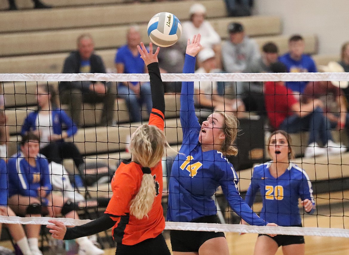 Senior Katelyn Matteson elevates for a block during a match at Priest River on Sept. 9.