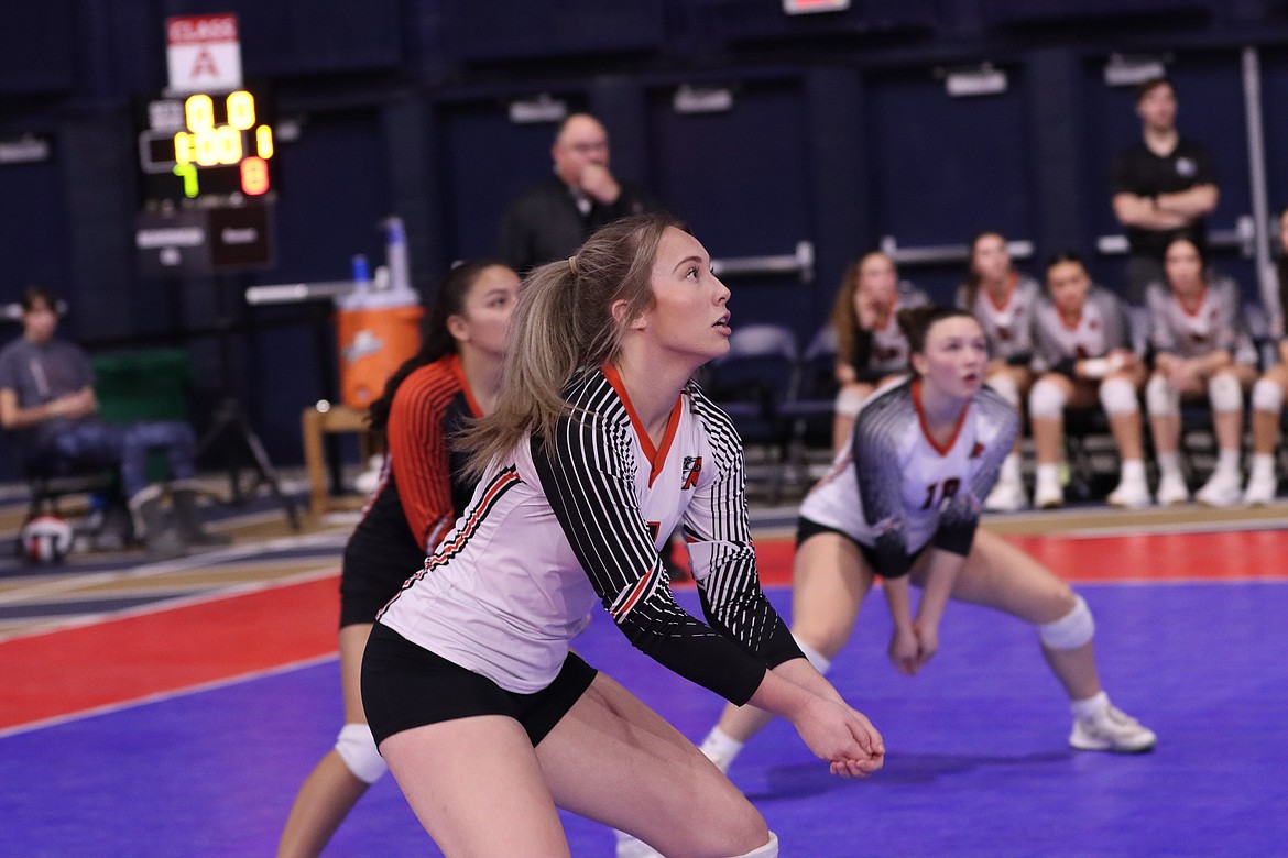 Ronan's Hannah Rowe, foreground, Margaret Cordova, left and Riley Lindquist prepare to defend. (Courtesy of Niki Graham)