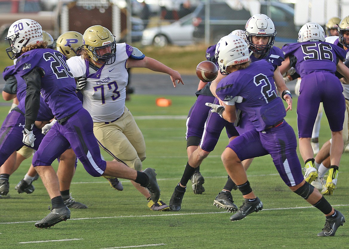 Lineman Aaron O'Roake looks for a tackle against Laurel. (Courtesy of Bob Gunderson)