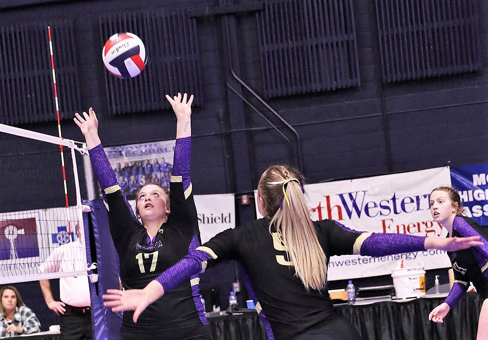 Avery Starr (17) sets the ball for Clara Todd (9) against Havre. (Courtesy of Bob Gunderson)