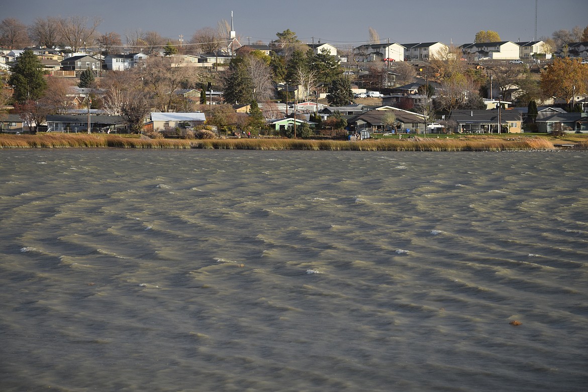 White caps on Moses Lake are driven by winds in excess of 50 mph on Monday afternoon.