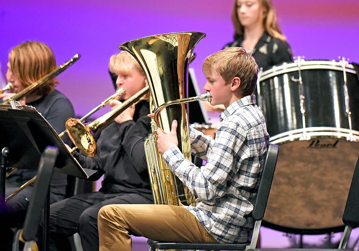 Whitefish eighth grader Landon Norberg plays the tuba with the middle school band at a recent concert at the Whitefish Performing Arts Center. (Whitney England/Whitefish Pilot)
