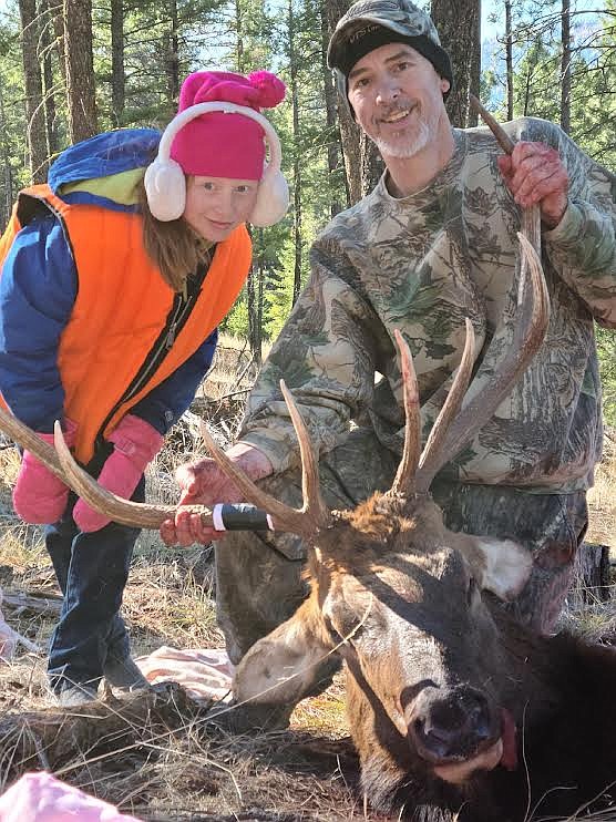 Halloween was definitely a treat for Rollins residents Jerry Norby and his daughter Morgan, 8, after they bagged this bull elk. (Submitted photo)