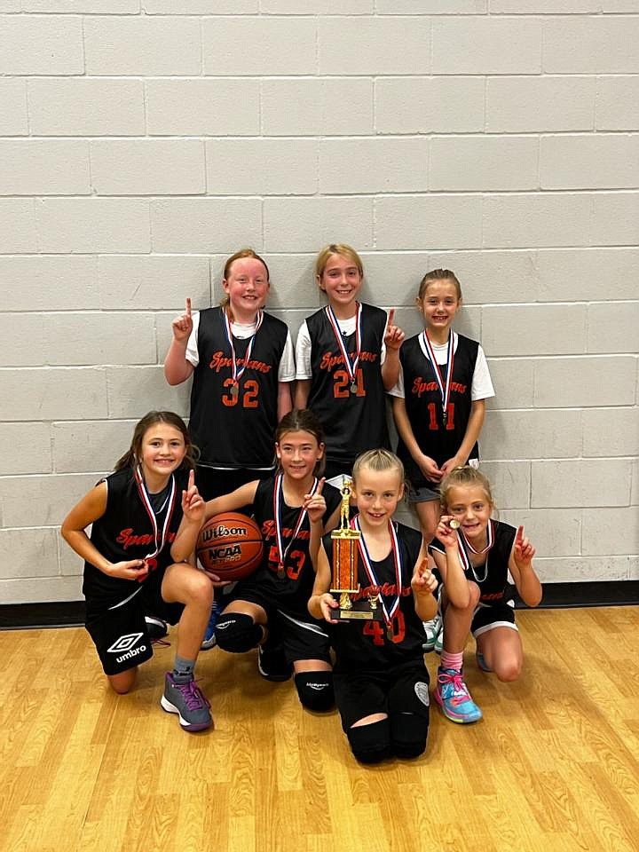 Courtesy photo
The Coeur d'Alene Lakers third-grade girls AAU basketball team won the fourth-grade division at the recent Post Falls River City Tournament. In the front row from left are Teagan Phenicie, Brylee Brown, Kinsley Wallis and Kailey Schneider; and back row from left, Mary Kate Doree, Kyal Carlson and Devyn Wassink.
