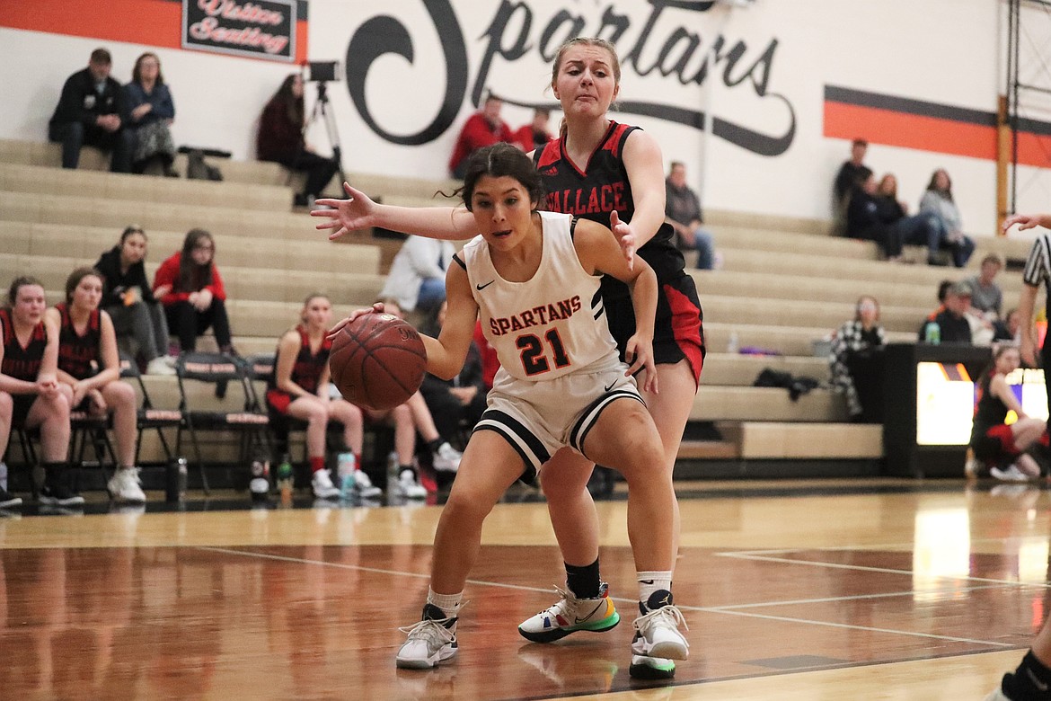 Lizzie McCracken gets down low in the paint on Tuesday.