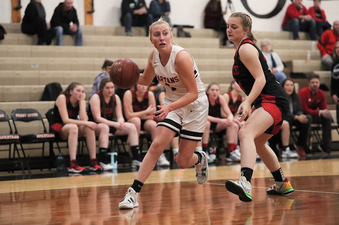 Marley Burgess-Duquette drives toward the basket on Tuesday.