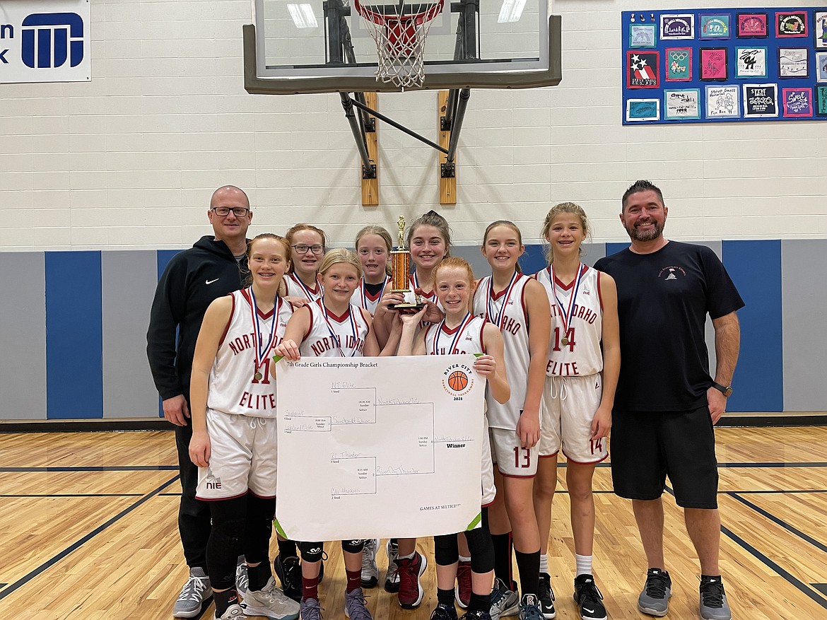 Courtesy photo
The North Idaho Elite seventh-grade girls basketball team went undefeated and placed first in last weekend's River City Tournament in Post Falls. In the front from left are Ashley Yates and Chloe Murphree; and back row from left, coach Eli Yates, Macie Zimmerman, Madison Zimmerman, Molly Carroll, Savoy Sternberg, Jordyn Tomco, Ella Pearson and coach Justin Sternberg.