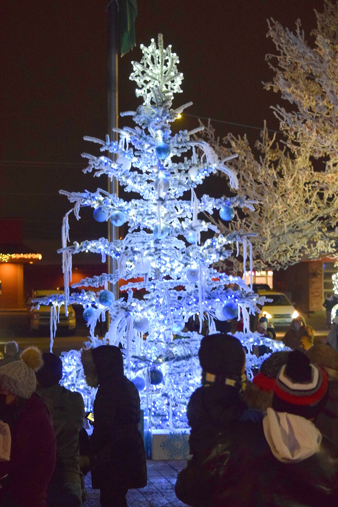 The Othello community Christmas tree sparkles on the lawn outside Othello City Hall in December 2020. Lighting the tree is part of the annual Christmas Miracle on Main Street celebration, scheduled for Dec. 4.
