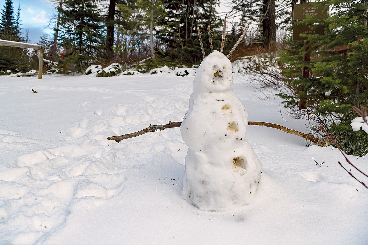 A snowman greeted me at the top.