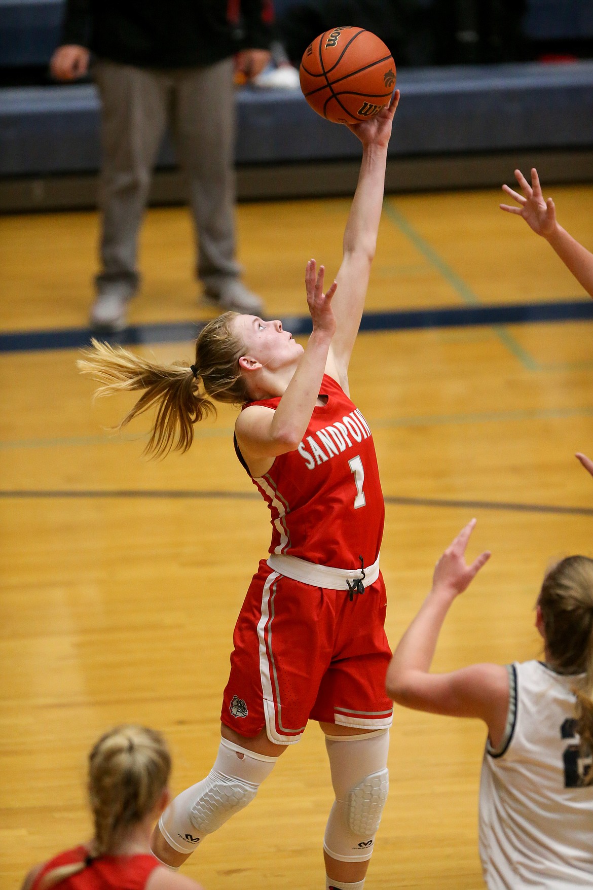 Junior Kelsey Cessna rises up for a rebound Thursday at Lake City High.