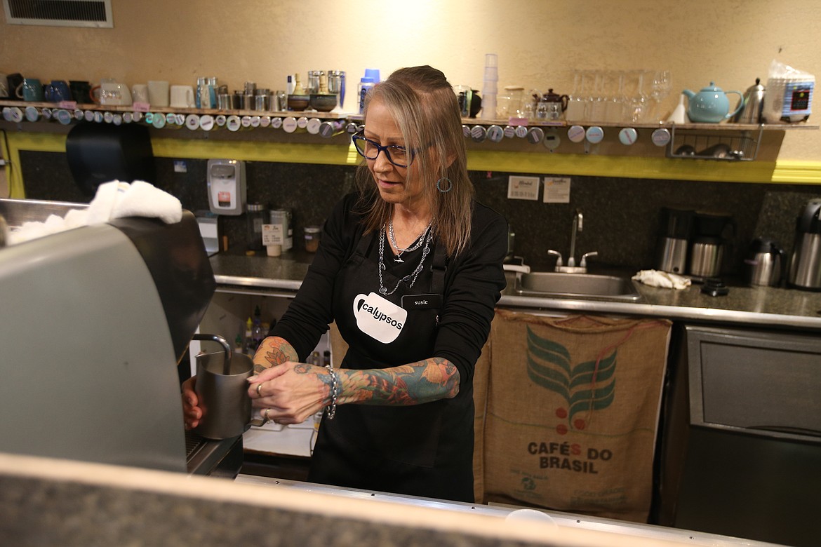 Barista Susie Walker has worked at Calypsos Coffee Roasters for about eight years. The downtown coffee shop and eatery is for sale.