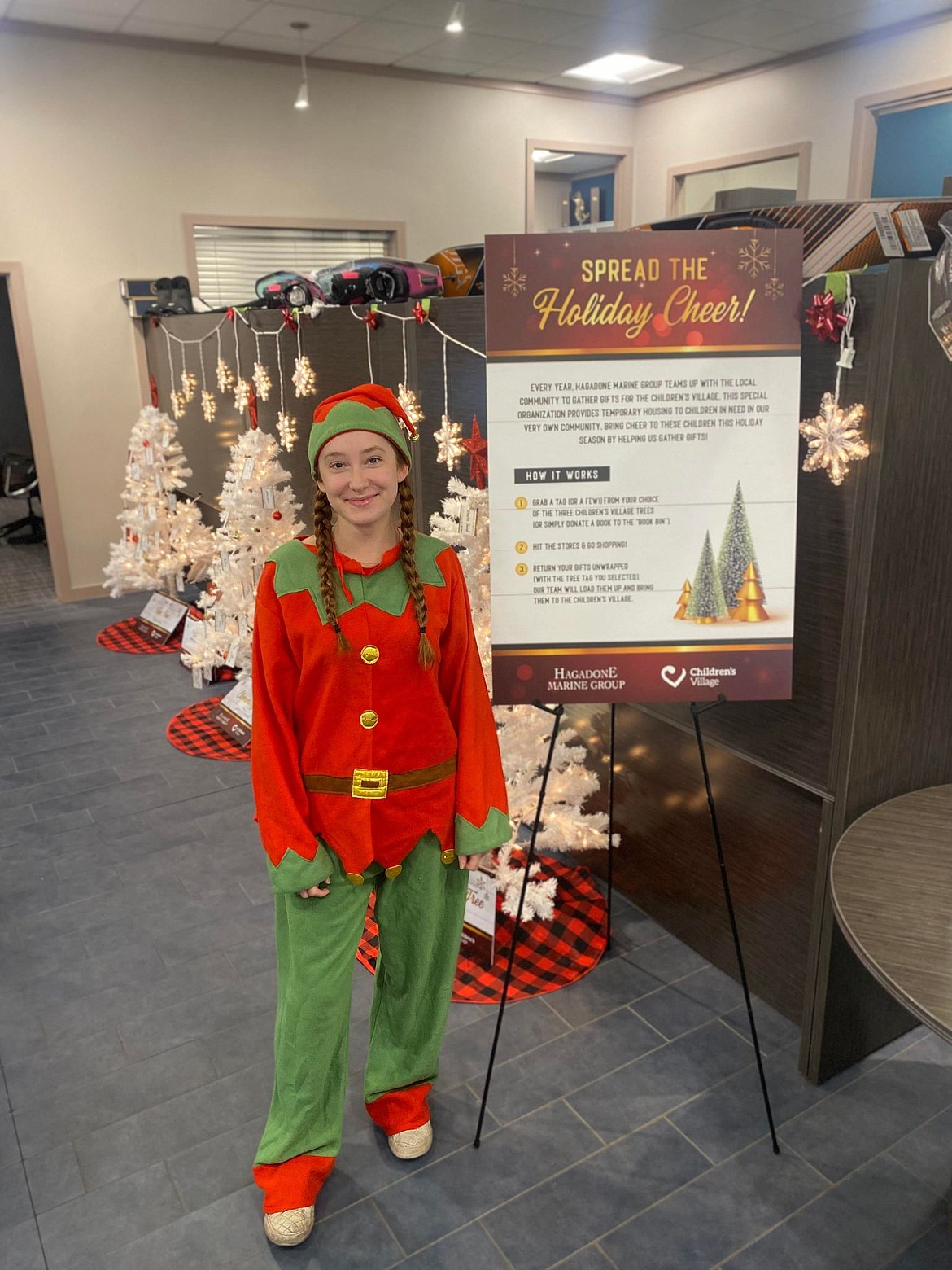 Trista Akins, a shop attendant for Blackwell Pro Shop at Hagadone Marine Group, is ready for their annual holiday gift drive.