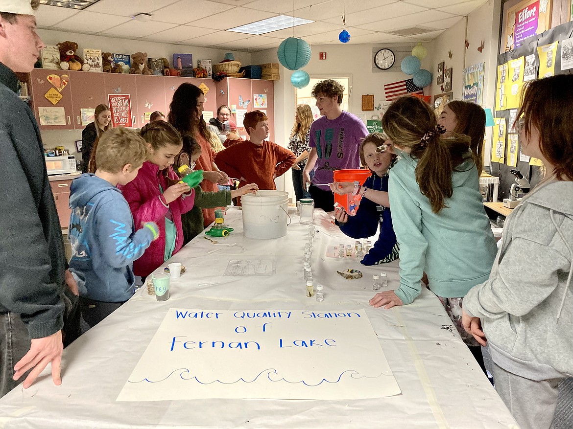 Coeur d'Alene High School environmental science students volunteered part of their day on Wednesday to teach Idaho history and science to fourth and fifth graders at Fernan STEM Academy. HANNAH NEFF/Press
