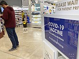 US opens COVID boosters to all adults, urges them for 50+