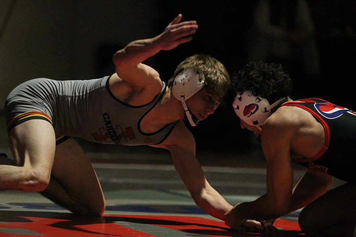 JASON ELLIOTT/Press
North Idaho College freshman Jett Strickenberger waits to make his move on Clackamas redshirt sophomore Nic Aguilar during their bout at 125 pounds on Friday night at Christianson Gymnasium.