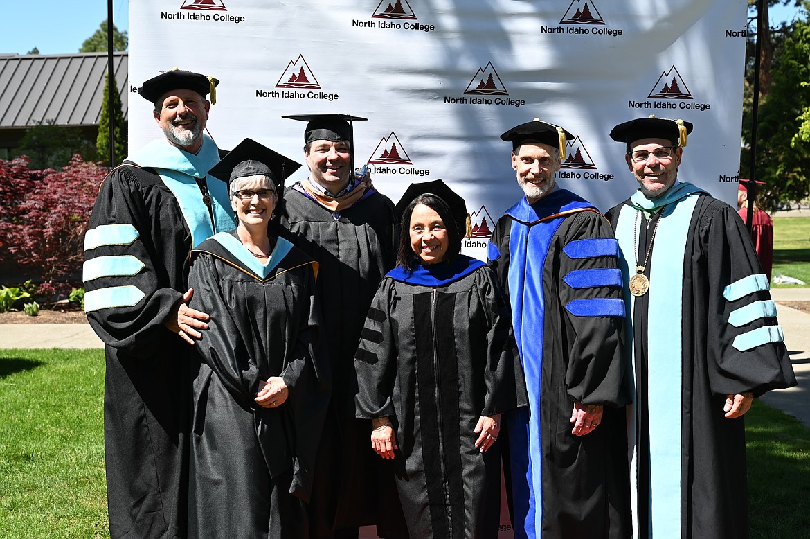 Taken at May's commencement ceremony, this photo shows leaders of North Idaho College who have already left or will be leaving the college by the end of the fiscal year. From left, Vice President for Student Services Graydon Stanley, retiring Jan. 3; Dean of Instruction, Workforce Education Christy Doyle, retiring Jan. 4; Vice President for Finance and Business Affairs Chris Martin, planning to retire at the end of the fiscal year in June; Vice President of Instruction Lita Burns, retiring Jan. 4; Dean of General Studies Larry Briggs, retired in May and former President Rick MacLennan, fired without cause by the board on Sept. 22. Photo courtesy of North Idaho College