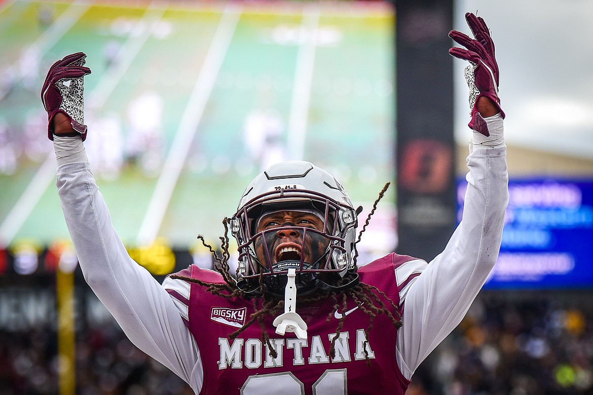 Montana cornerback Justin Ford (21) pumps up the crowd during the 120th Brawl of the Wild at Washington-Grizzly Stadium on Saturday, Nov. 20. (Casey Kreider/Daily Inter Lake)