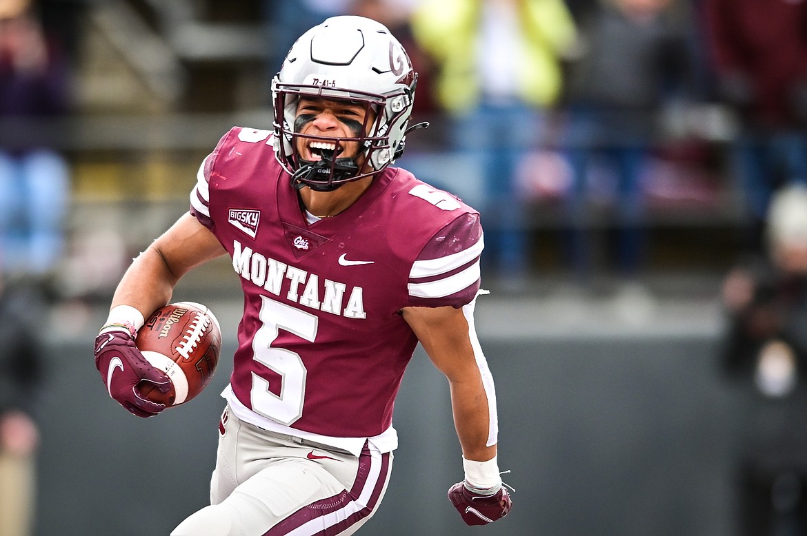 Montana running back Junior Bergen (5) celebrates after a 74-yard touchdown reception in the first quarter against Montana State during the 120th Brawl of the Wild at Washington-Grizzly Stadium on Saturday, Nov. 20. (Casey Kreider/Daily Inter Lake)