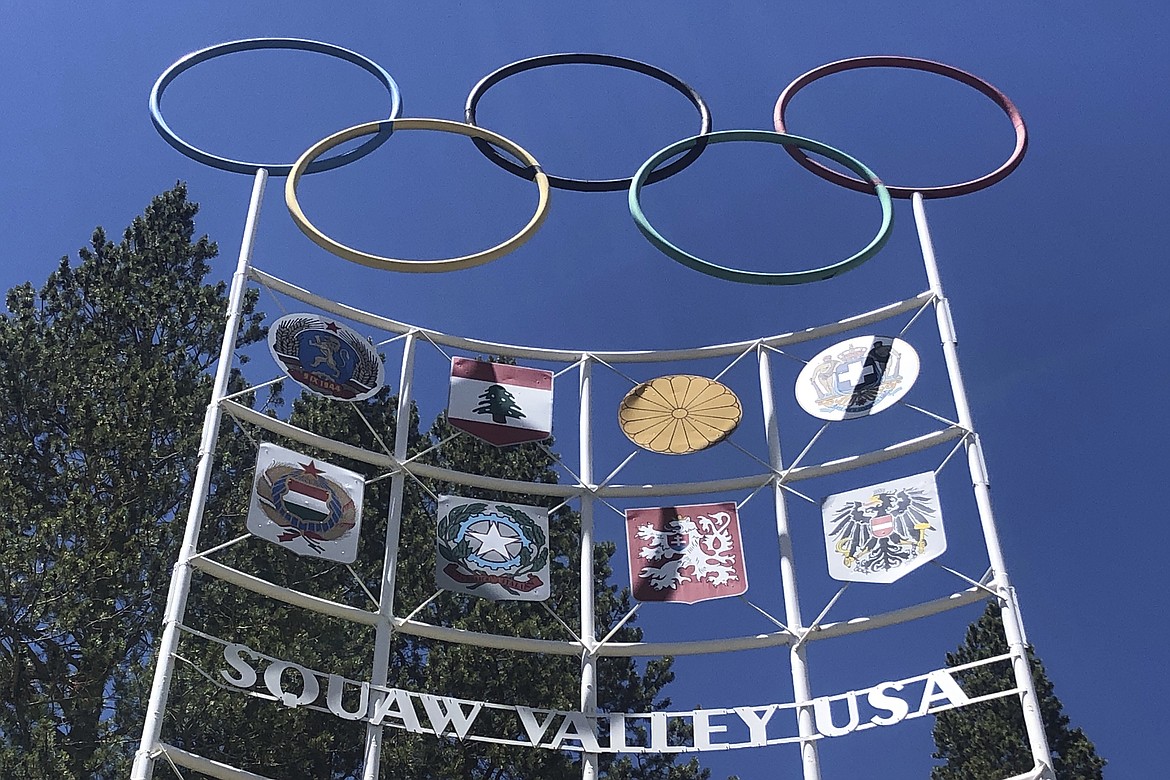 The Olympic rings stand atop a sign at the entrance to the Squaw Valley Ski Resort in Olympic Valley, Calif., on July 8, 2020.