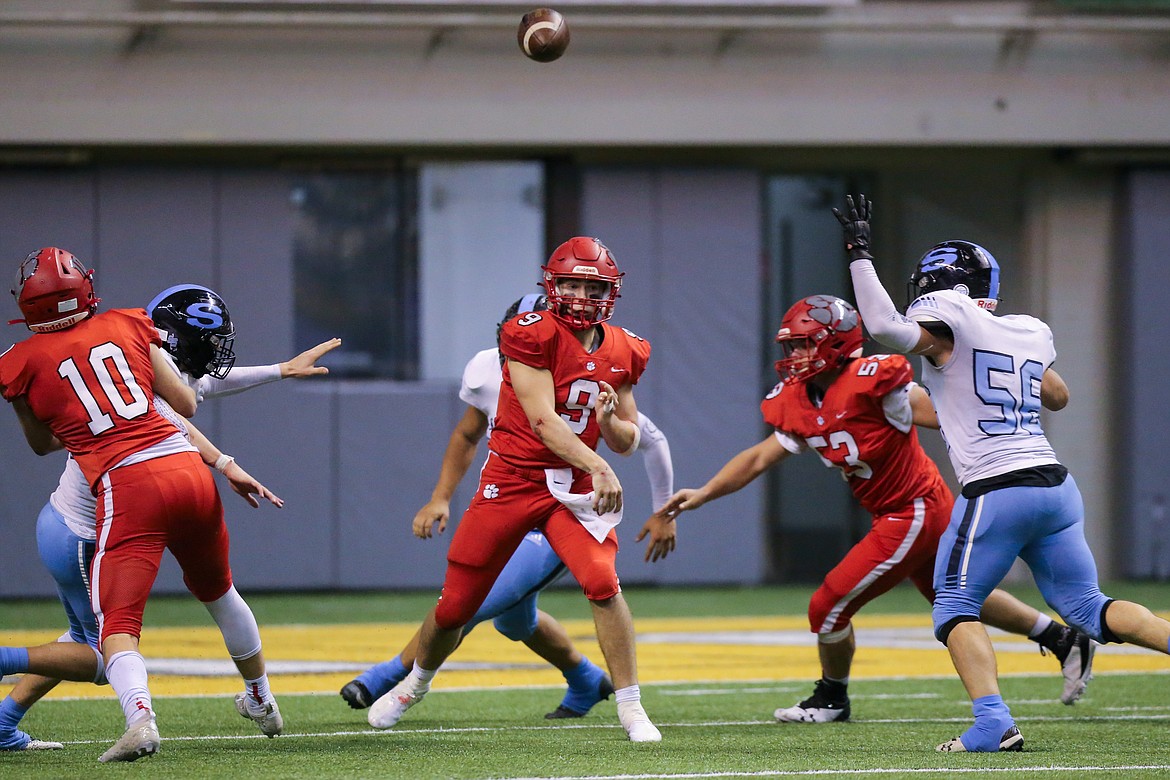 Quarterback Parker Pettit throws a pass during Friday's state championship.