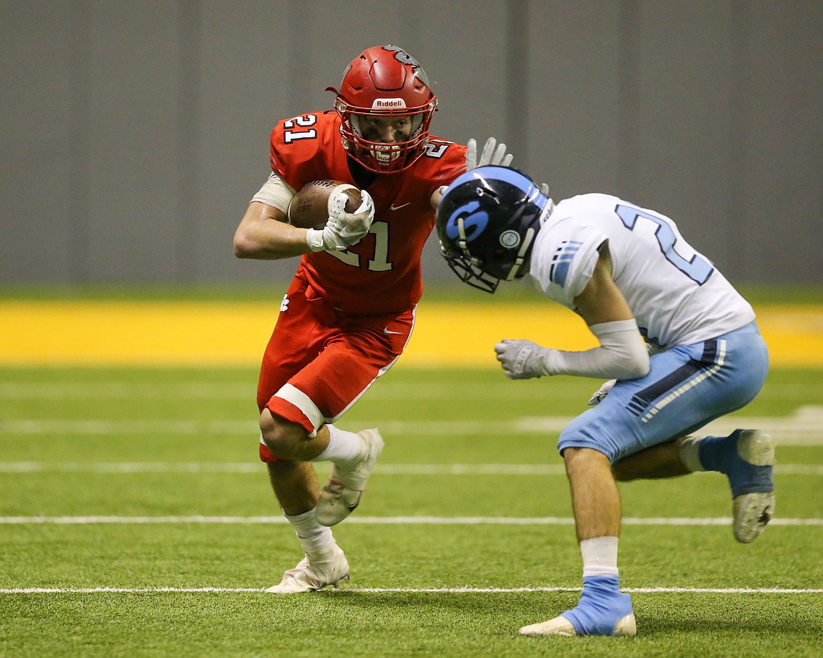 Senior Luke McCorkle catches a pass and looks to make a play during Friday's 4A state championship.