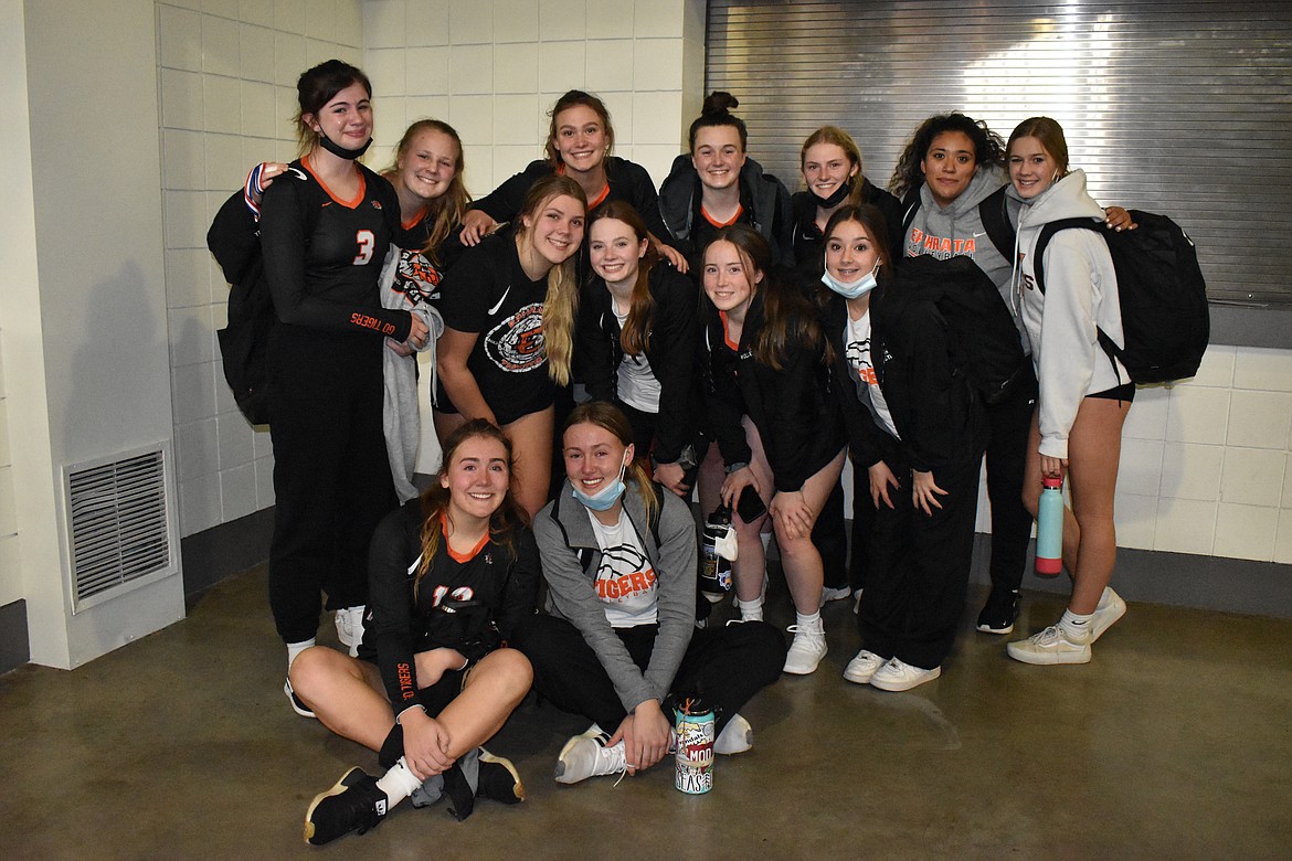 The Ephrata Lady Tigers pose Friday at the Washington Interscholastic Activities Association State Championships 2A volleyball tournament.