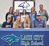 Signing photos Nov. 25, 2021
