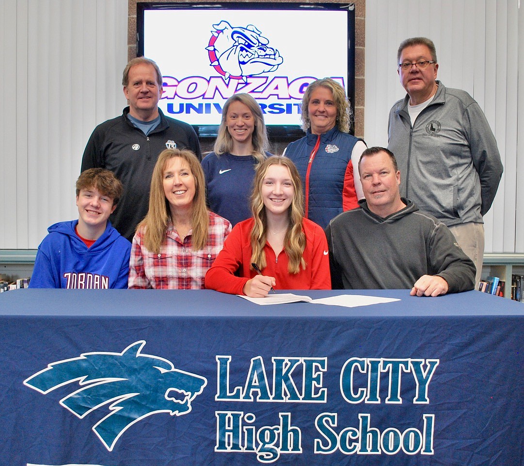 Courtesy photo
Lake City High senior Hanah Stoddard recently signed a letter of intent to play volleyball at Gonzaga. Seated from left are Cole Stoddard (brother), Sage Stoddard (mom), Hanah Stoddard and Shane Stoddard (dad); and standing from left, Brian Hosfeld, T3 club director and coach; Michelle Kleinberg, Lake City High head volleyball coach; Barb Patton, Lake City High assistant volleyball coach; and Jim Winger, Lake City High athletic director.
