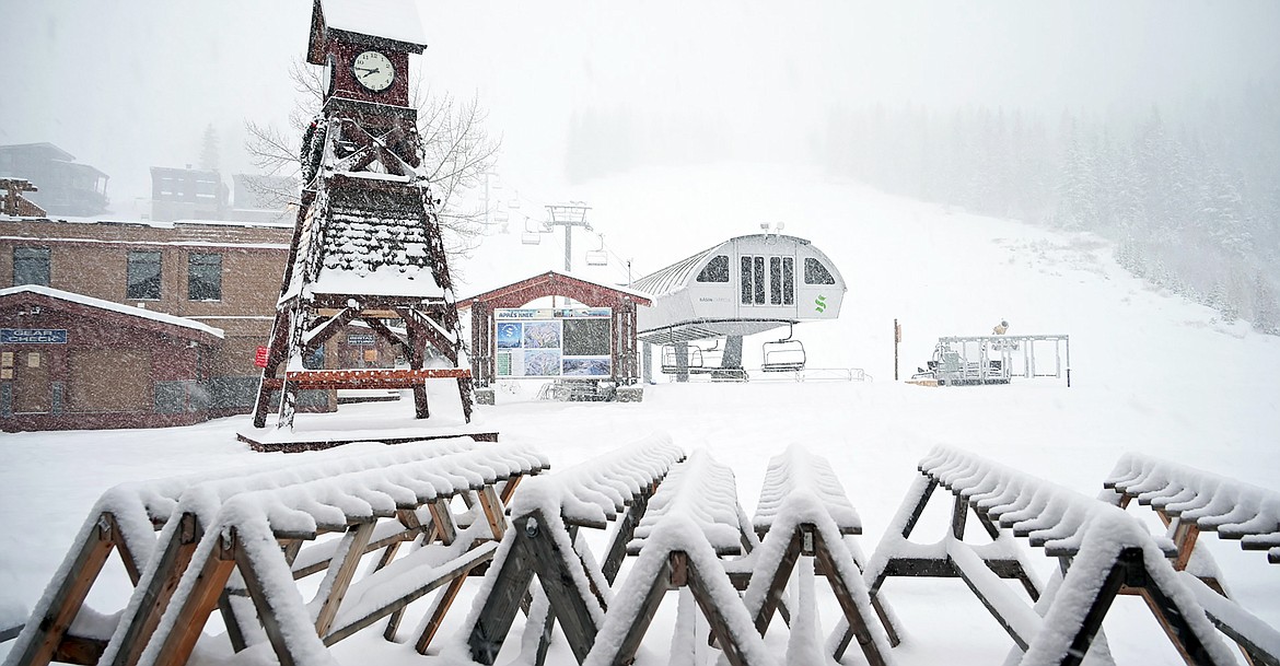 Snow blankets the village area at Schweitzer and continues to fall as the resort received 5 inches of snow as it prepares to open on Friday, Nov. 26.