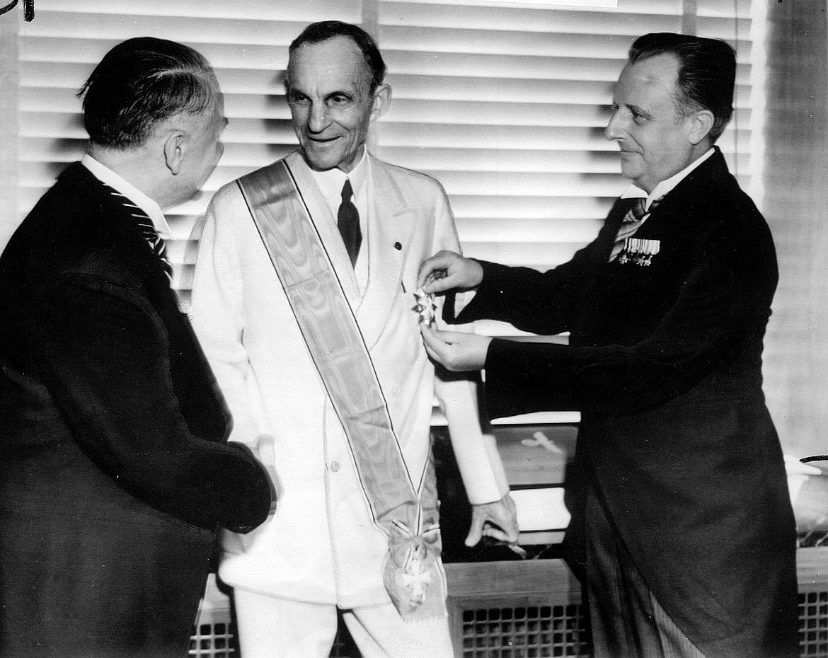 German Consul General Karl Kapp pins Germany’s highest decoration for foreigners, The Grand Cross of the German Eagle, on Henry Ford in Detroit on July, 30, 1938.