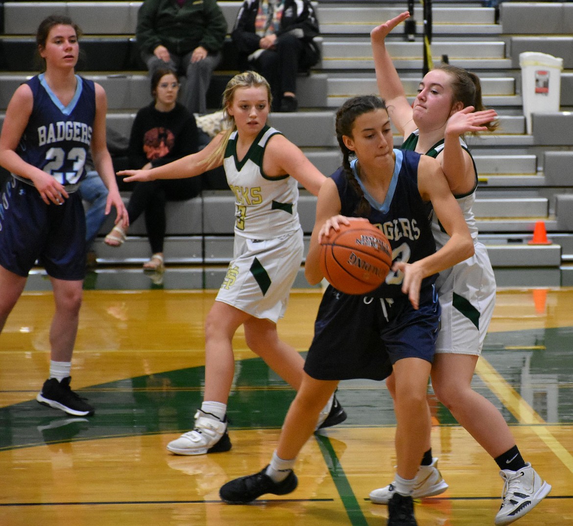 Brooke Petesch defending the ball before a drive.