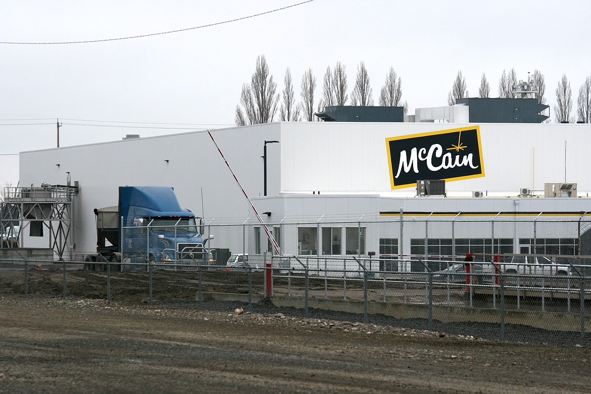 A truck leaves the McCain Foods facility in Othello. The manufacturing sector, which is mostly food processing in Adams County, is one of the growing sectors in the county’s economy.