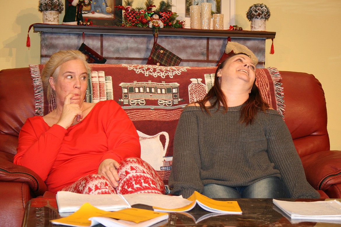 Nora (Carrie Rutherford, left) is dubious about her sister Nicole’s (Jessica Hogge, right) mood in the Masquers Theater production of “Sleeping Indoors.” The show opens Dec. 3.