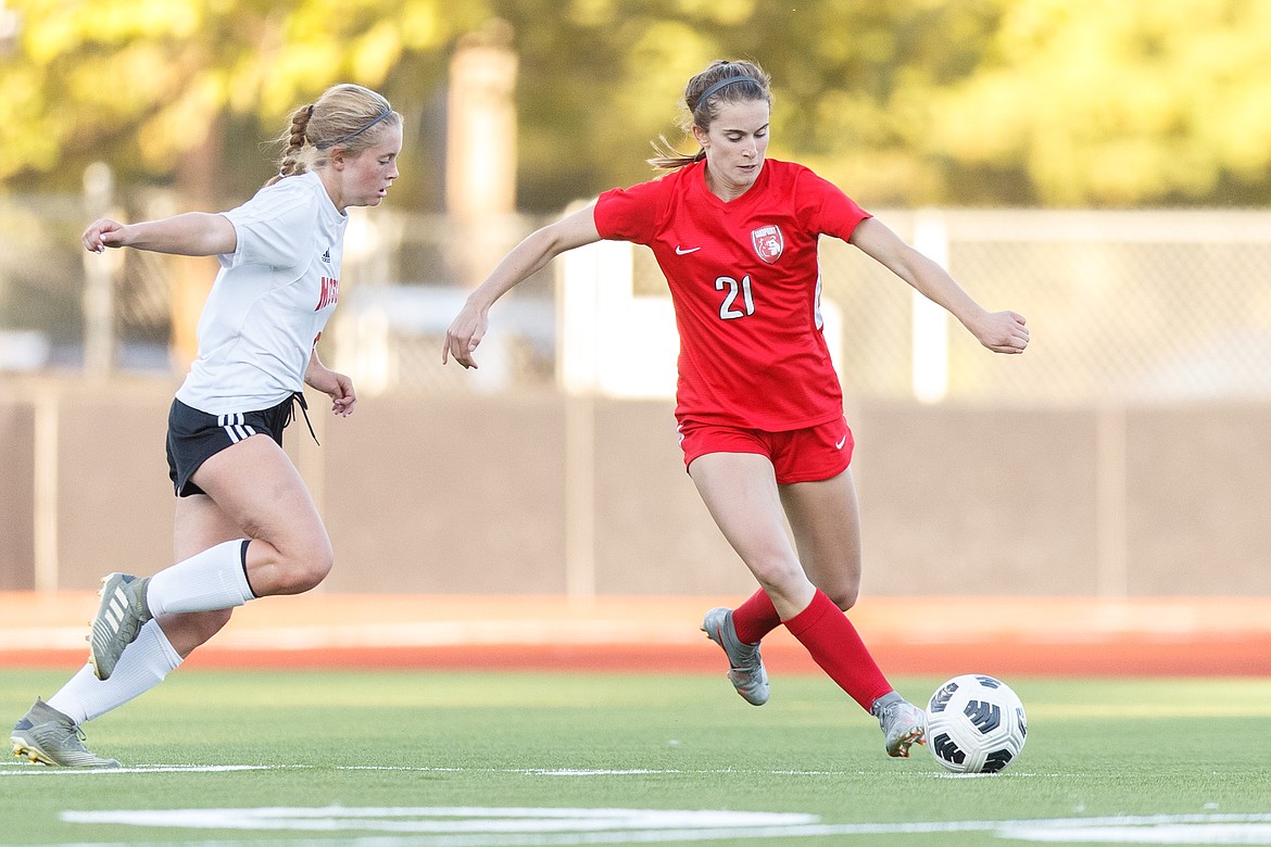 Senior Piper Frank looks for a teammate in a game against Moscow on Sept. 23 at War Memorial Field. She was named first-team all-state for the second time.
