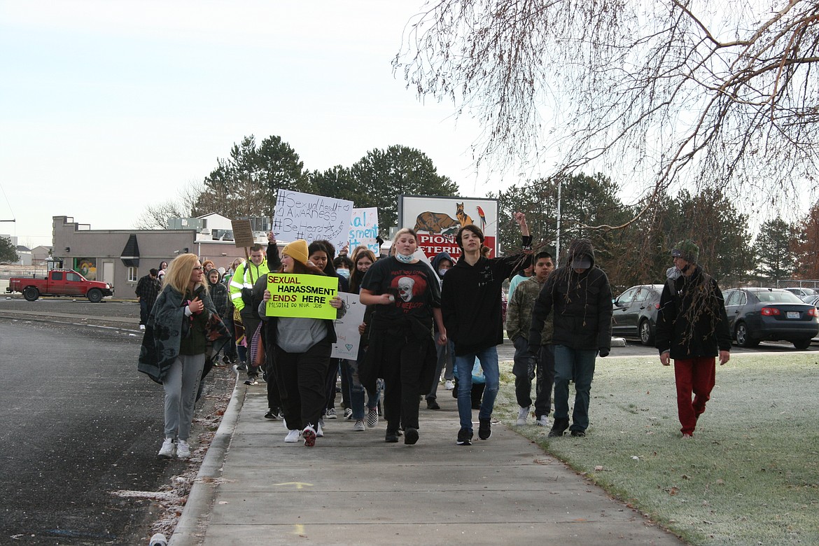 Students from Moses Lake High School march Wednesday to protest what they said was an inadequate response to allegations of sexual harassment and assault among MLHS students.