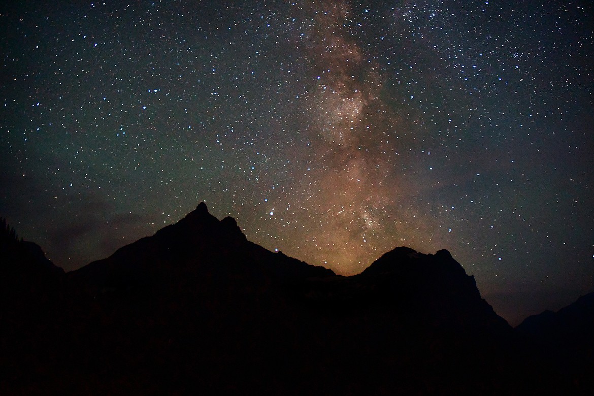 The Milky Way rises over Glacier National Park. Glacier and its sister park, Waterton Lakes National Park in Canada, were certified as Dark Sky Parks by the International Dark Sky Association in August. (Jeremy Weber/Daily Inter Lake)