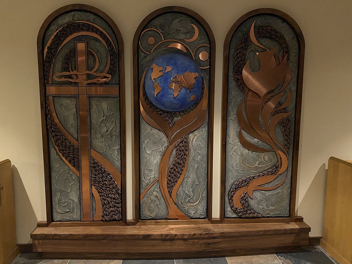 A metal-work sculpture created by local artist Rebecca Ames Anderson for the sanctuary of Trinity Lutheran Church in Coeur d'Alene.