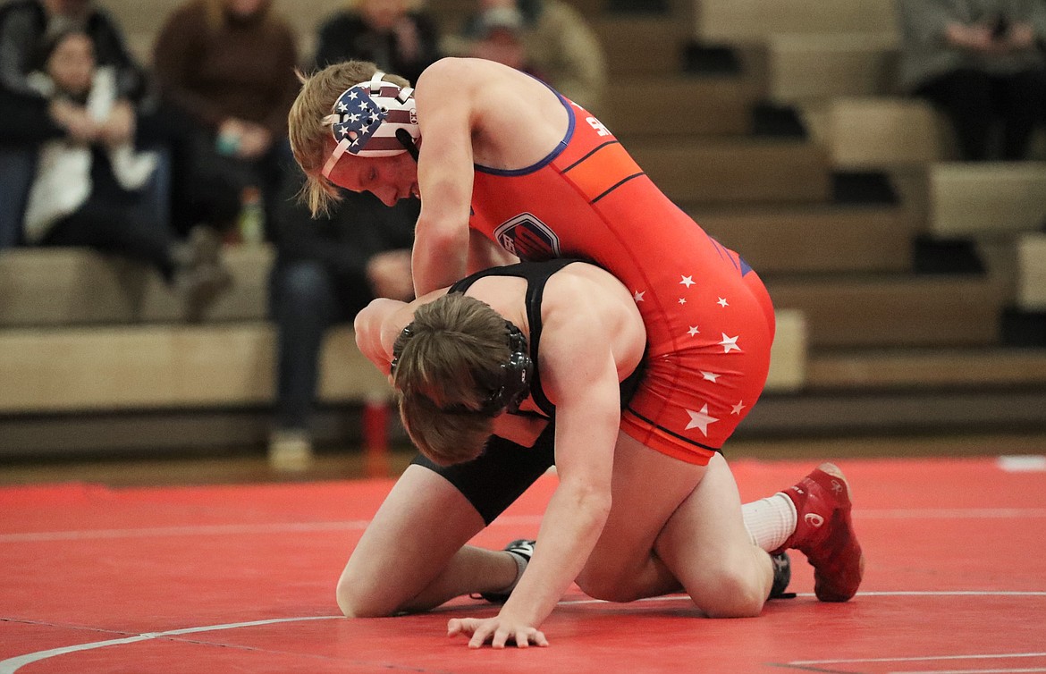 Shane Sherrill (red) takes control of his match on Wednesday.