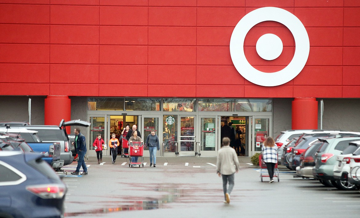 Shoppers come and go at Target off U.S. 95 on Friday morning.